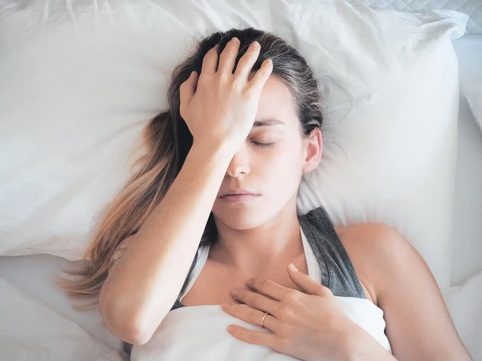 woman with morning headache from sleep apnea